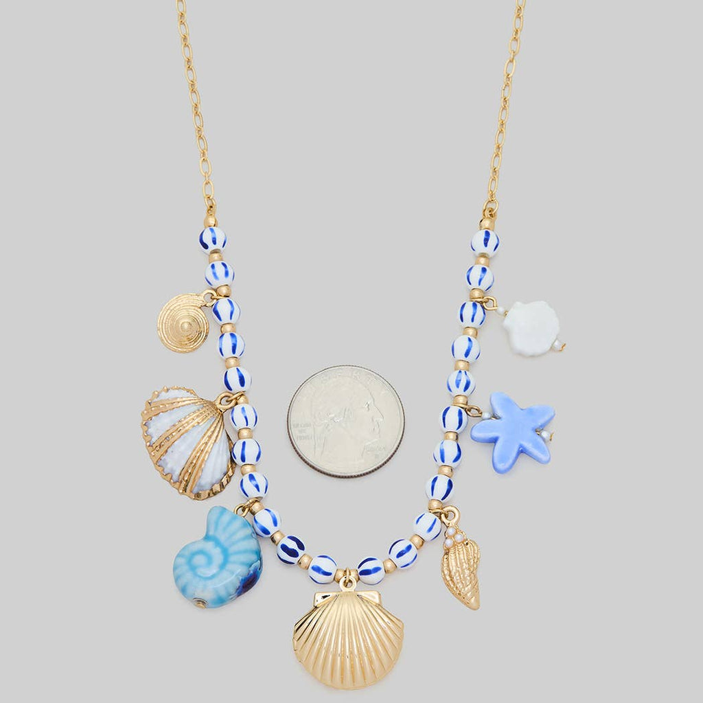 CERAMIC SEA LIFE CHARM AND SHELL LOCKET NECKLACE